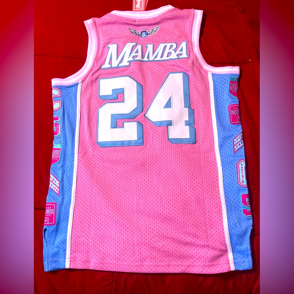 I’m selling a pink, blue & white headgear classics Kobe jersey size small